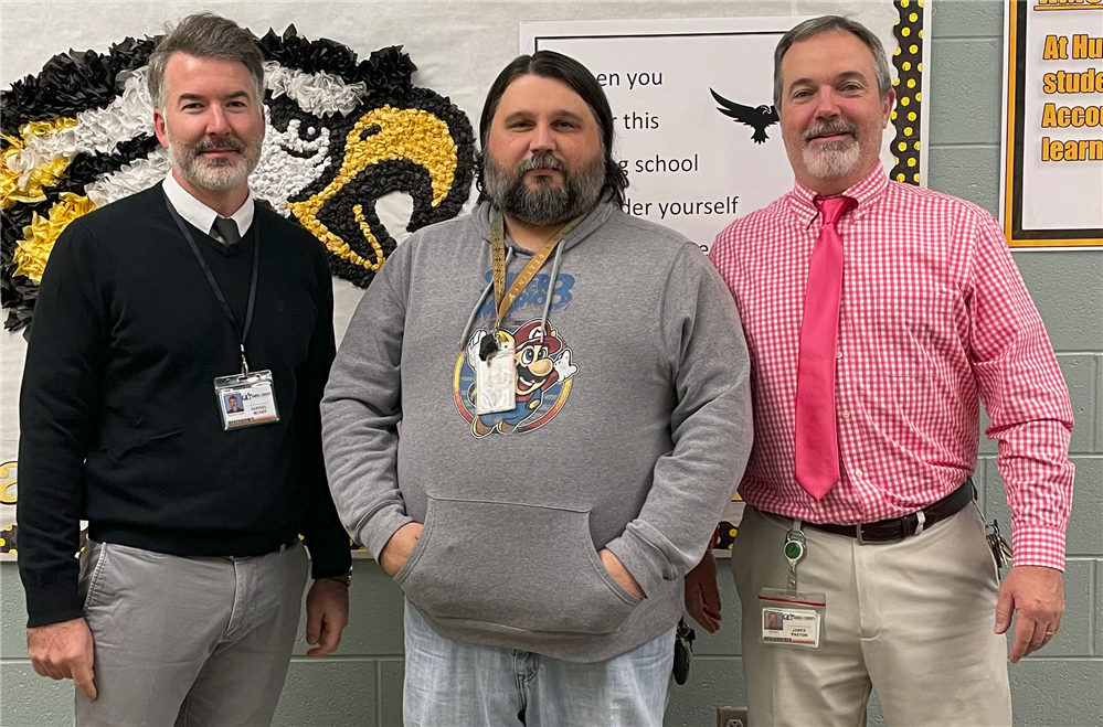  Mr. McKee and Mr. Paxton, with Mr. Black, our Staff Member of the Month for September