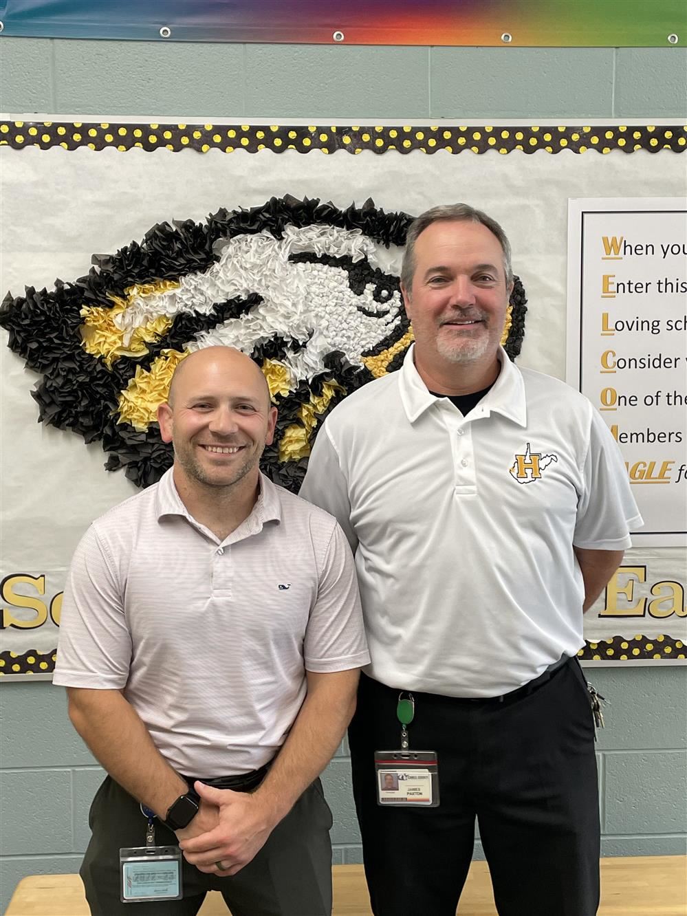  Mr. Jim Paxton, Principal, with Mr. Steve Riner, the August Staff Member of the Month