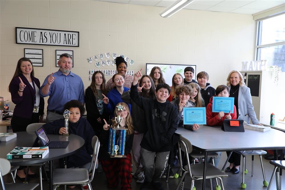  Taneisha Sturdavent and students picture with trophy